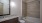 shower/tub combo in brightly lit bathroom